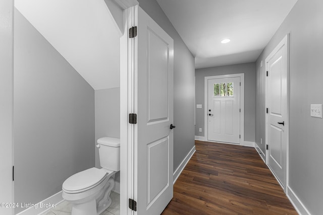 doorway to outside featuring dark hardwood / wood-style flooring