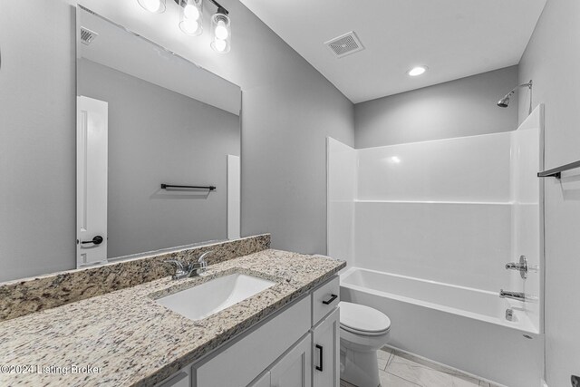 full bathroom with toilet, vanity, and tub / shower combination