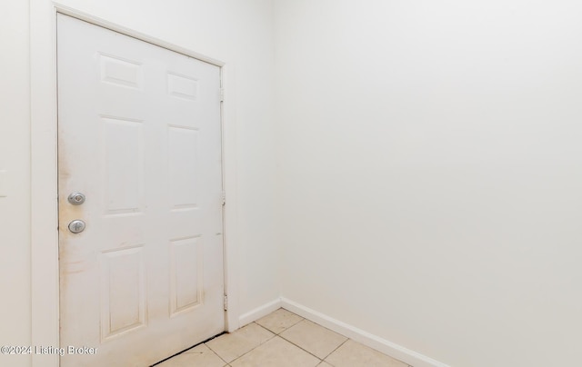 entryway featuring light tile patterned floors