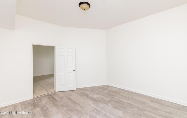 unfurnished room featuring light wood-type flooring