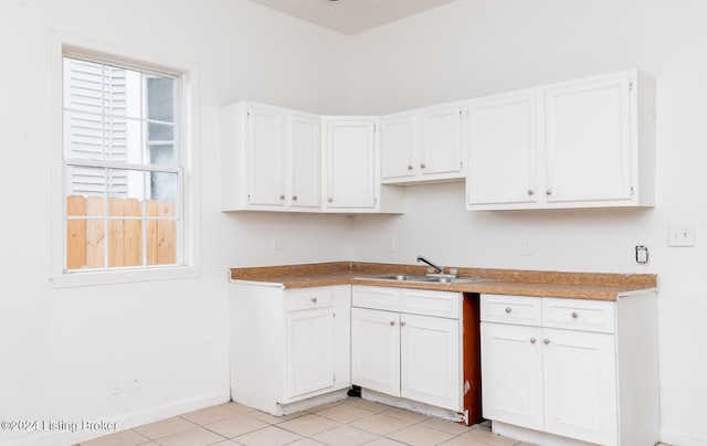 kitchen with white cabinets and sink