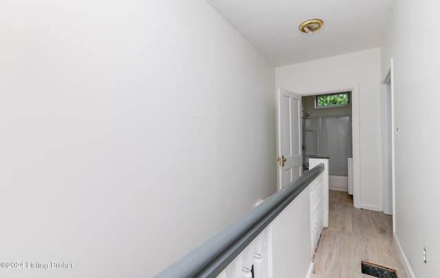 hall featuring light hardwood / wood-style flooring