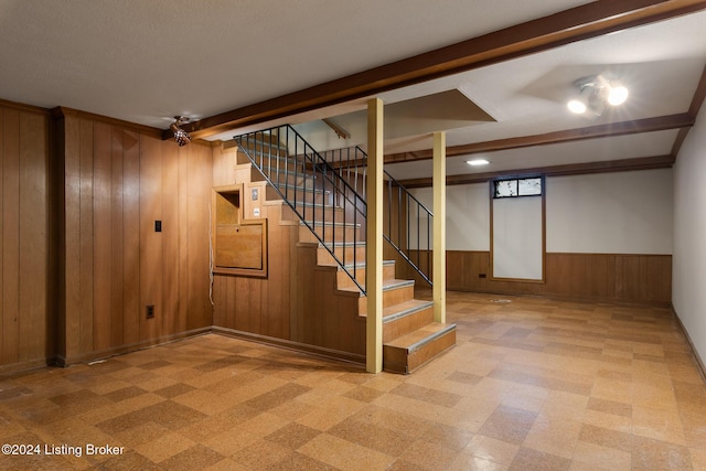 basement with wood walls