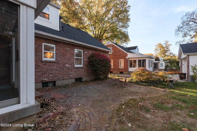 exterior space with a patio area