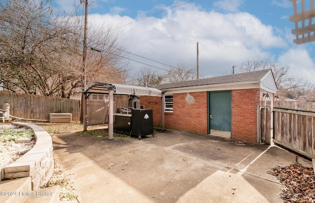 back of house with a patio area