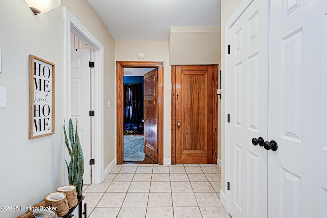 hallway featuring light tile patterned floors