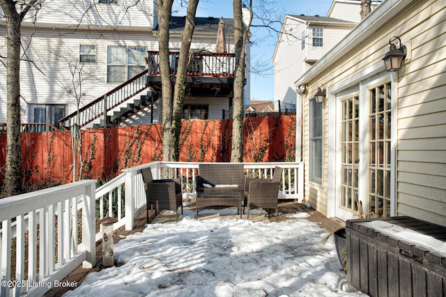 view of snow covered deck