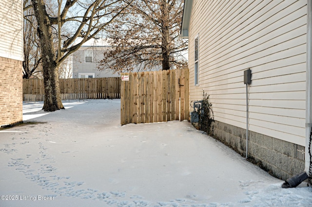 view of yard covered in snow