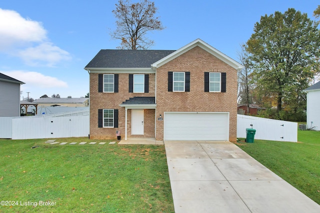 view of front facade with central AC, a front lawn, and a garage