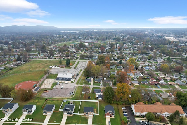 drone / aerial view featuring a mountain view