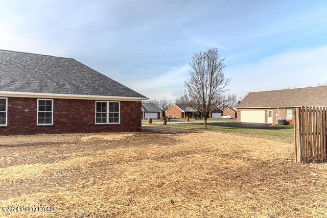 view of yard with a garage