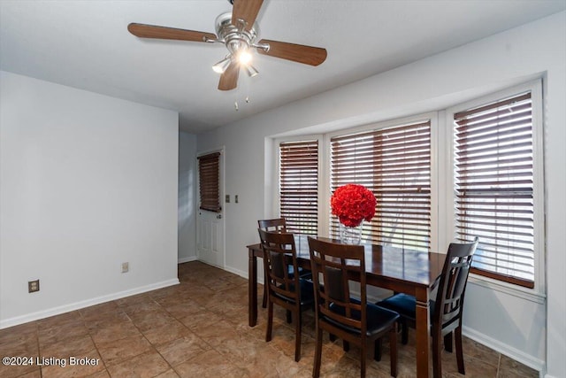 dining area with ceiling fan
