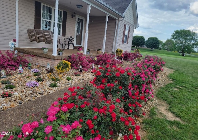 exterior space featuring covered porch