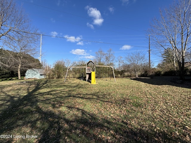 view of yard with a playground