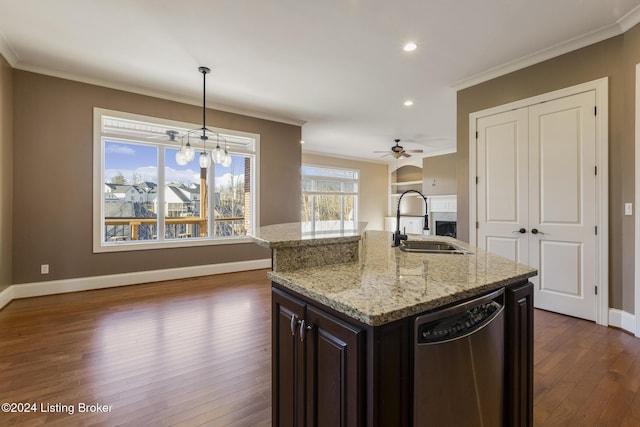 kitchen with sink, stainless steel dishwasher, dark hardwood / wood-style floors, an island with sink, and decorative light fixtures