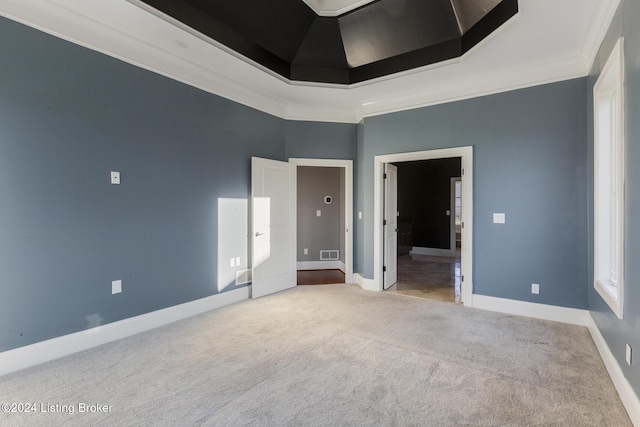 unfurnished bedroom with carpet flooring and crown molding