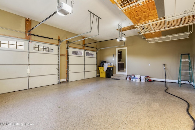 garage featuring a garage door opener