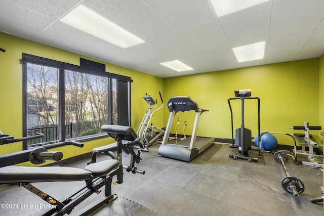 workout area with a drop ceiling