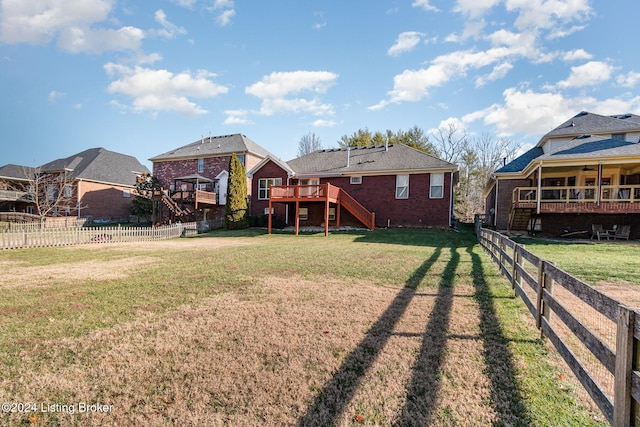 view of yard featuring a wooden deck