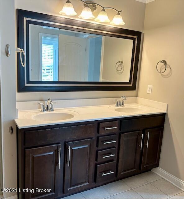 bathroom with vanity and tile patterned floors