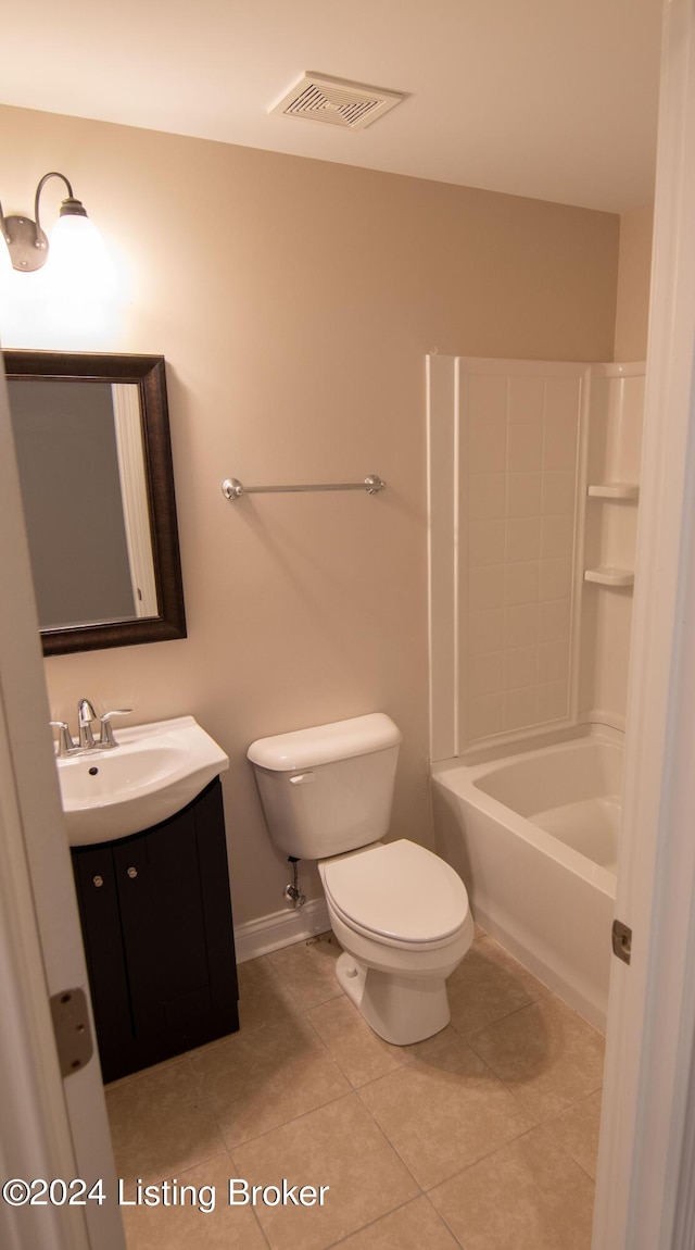 full bathroom featuring tile patterned flooring, vanity, toilet, and shower / bathtub combination