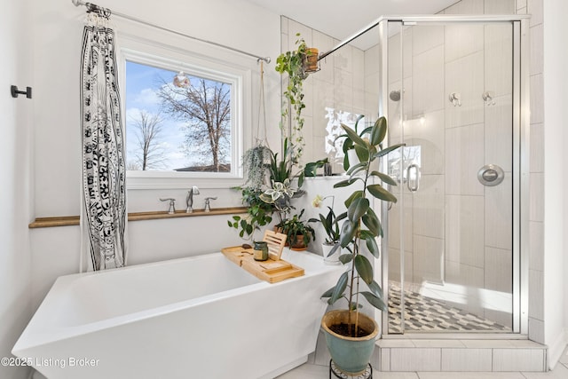 bathroom with independent shower and bath