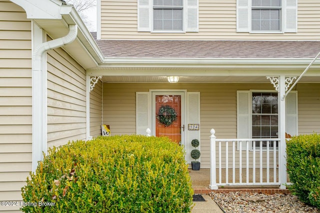 doorway to property with covered porch