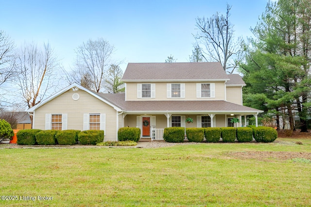 view of front of house with a front lawn and covered porch