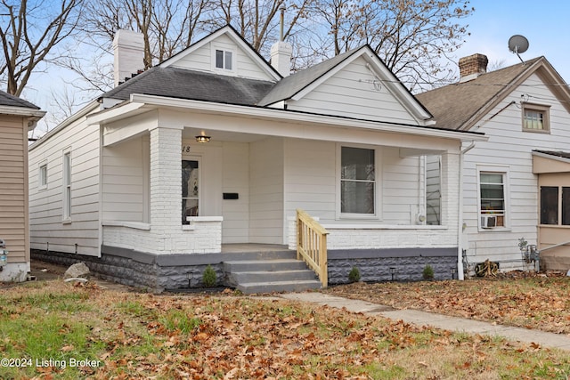 bungalow-style home featuring covered porch