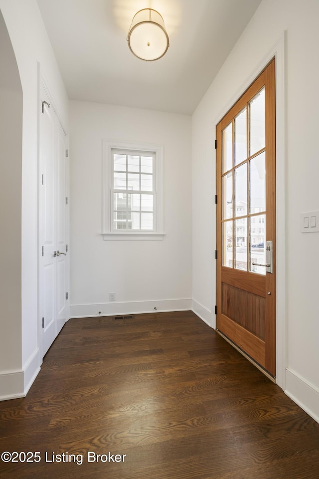 foyer featuring dark hardwood / wood-style floors