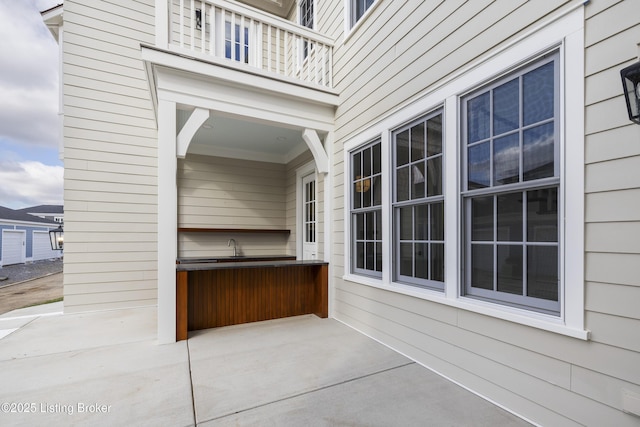 view of patio / terrace featuring a balcony