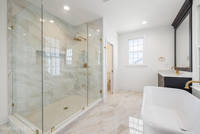 full bathroom with vanity, shower with separate bathtub, and toilet