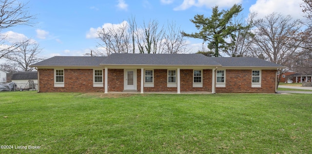 single story home with a front yard