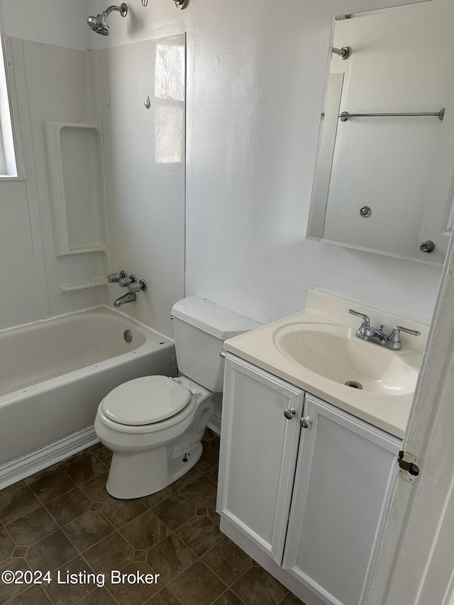 full bathroom with vanity, bathtub / shower combination, and toilet