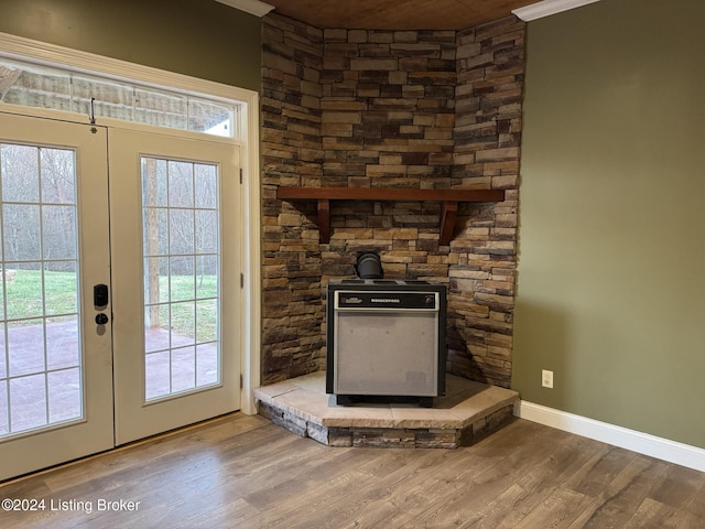 interior space with french doors and hardwood / wood-style floors