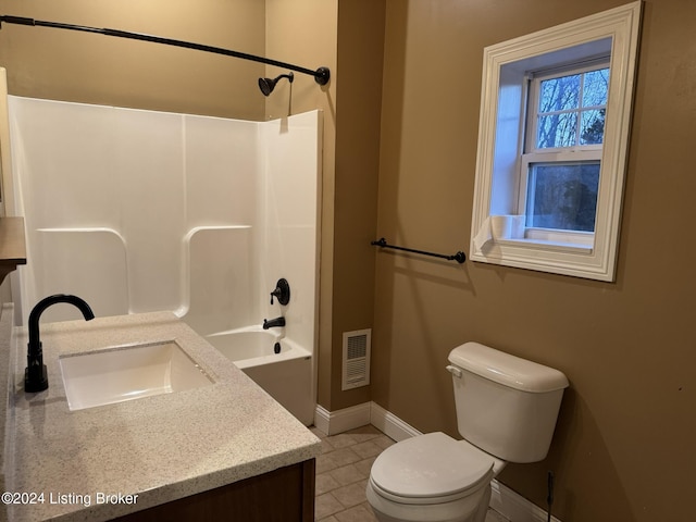 full bathroom featuring shower / bathing tub combination, vanity, toilet, and tile patterned floors