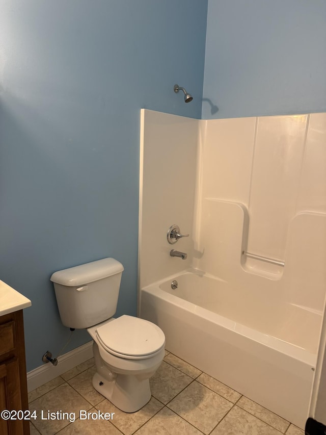 full bathroom featuring tile patterned flooring, vanity, toilet, and shower / bath combination