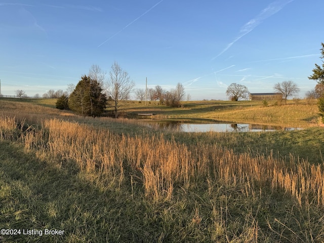 view of nature featuring a rural view and a water view