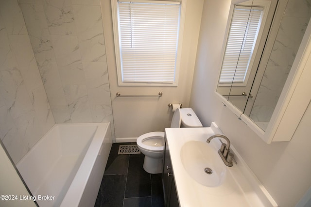 bathroom with tile patterned floors, vanity, and toilet