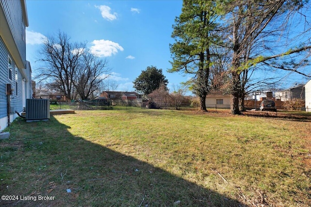 view of yard with central AC unit