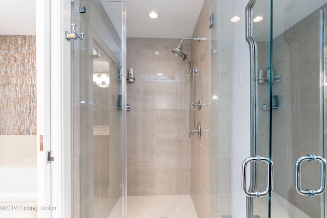 bathroom with an enclosed shower