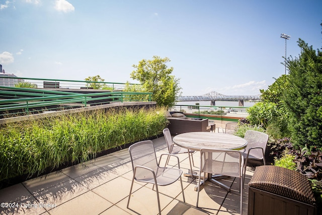 view of patio / terrace featuring a water view