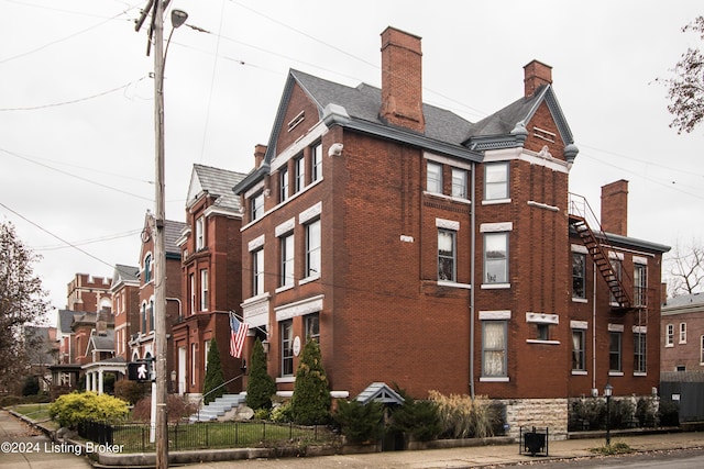 view of building exterior featuring central AC