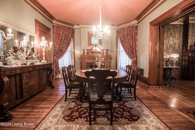 dining room featuring ornamental molding, an inviting chandelier, and a healthy amount of sunlight