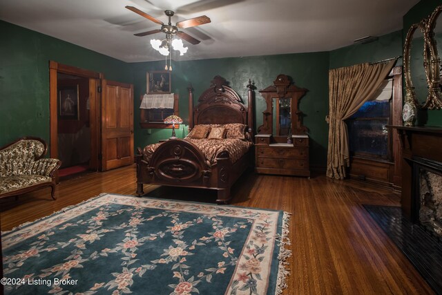 bedroom featuring ceiling fan and wood-type flooring