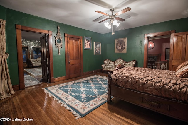 bedroom featuring hardwood / wood-style floors and ceiling fan