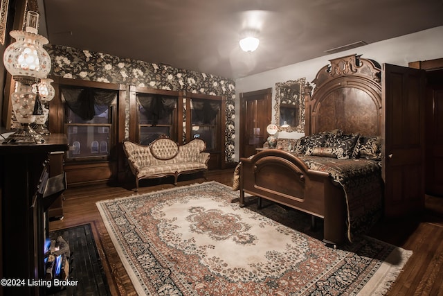 sitting room featuring dark hardwood / wood-style flooring