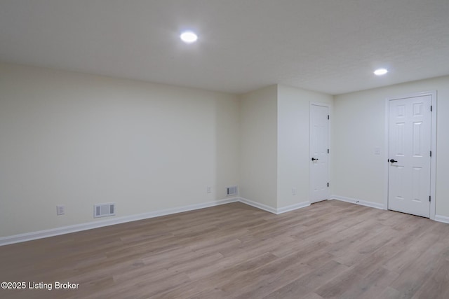 9415 Rockycreek Ln, Louisville, KY 40299 - unfurnished room with light wood finished floors, visible vents, recessed lighting, and baseboards