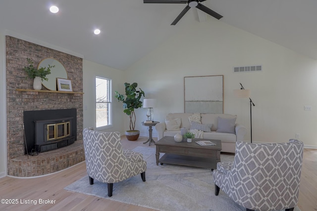 9415 Rockycreek Ln, Louisville, KY 40299 - living area featuring visible vents, baseboards, ceiling fan, wood finished floors, and high vaulted ceiling