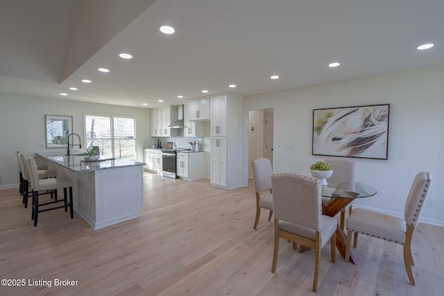 9415 Rockycreek Ln, Louisville, KY 40299 - dining space featuring recessed lighting, light wood-type flooring, and baseboards